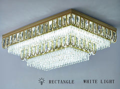 Rectangular chandelier with crystal accents on a gray background