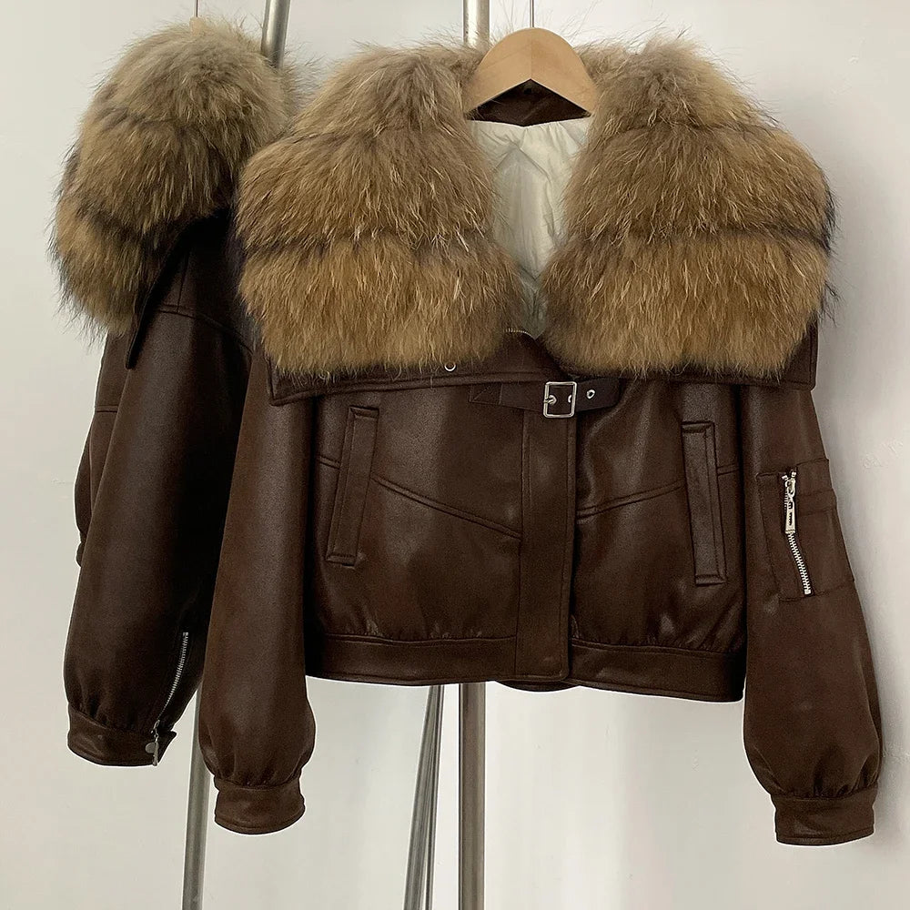 Brown leather jacket with fur collar on a hanger against a white background