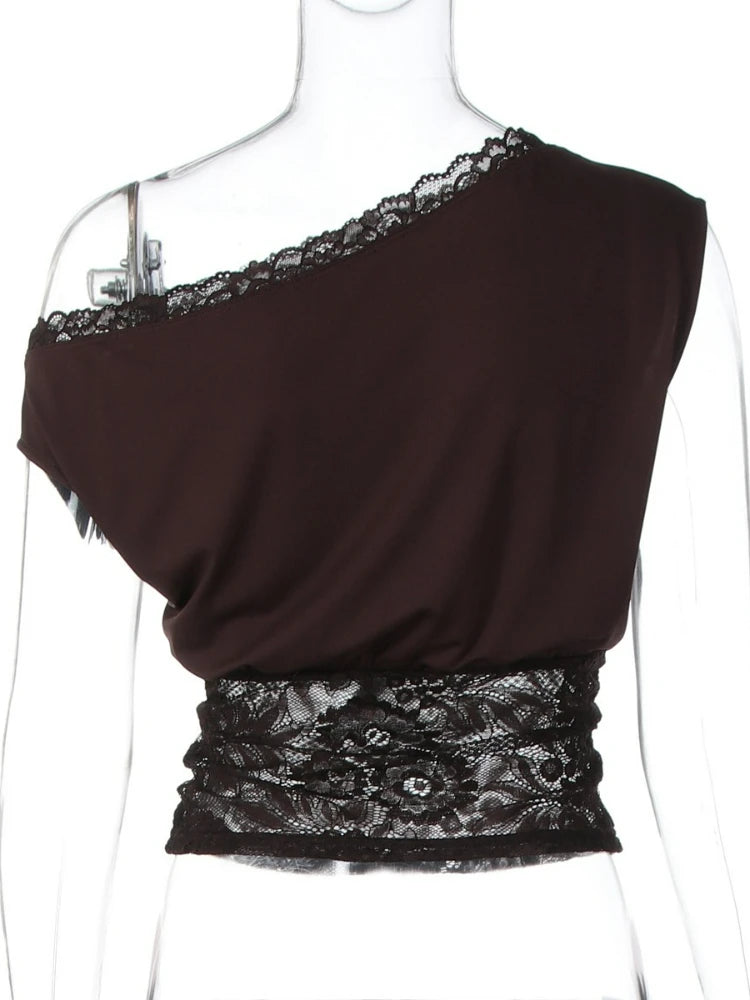 Brown one-shoulder top with lace details on a mannequin against a white background