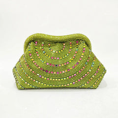 Lime green crystal-embellished clutch bag with curved pattern and chain strap