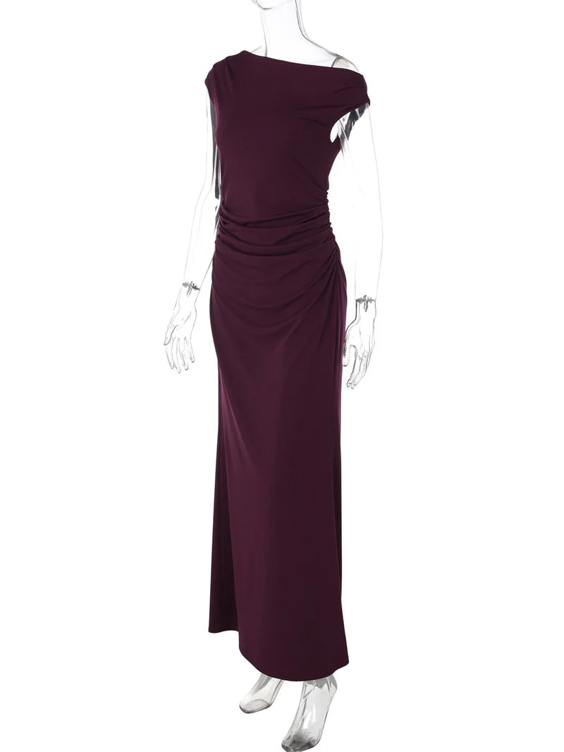 Purple one-shoulder evening gown on a mannequin against a white background