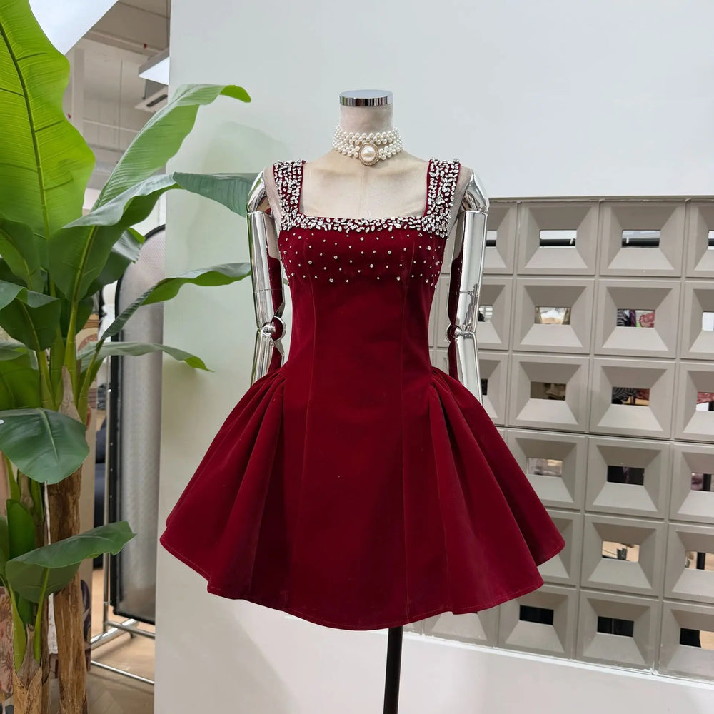 Red dress on a mannequin with a white background