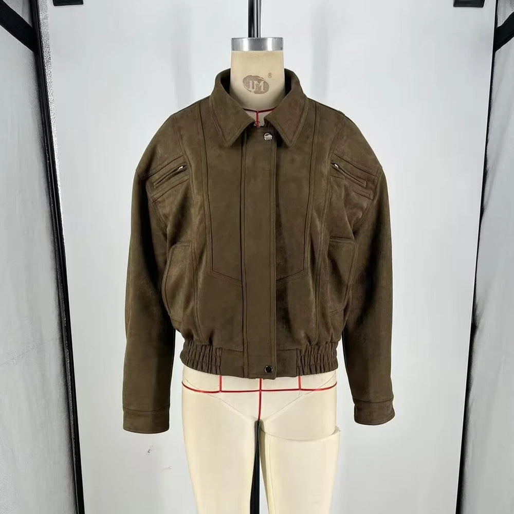 Brown jacket on a mannequin against a white background