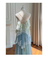 Lace trim ombre camisole dress draped on mannequin