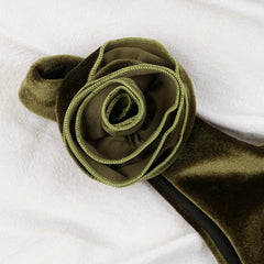 Close-up of velvet rosette detail on bikini top strap