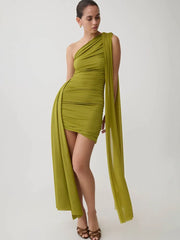 Close-up of one-shoulder ruched mini dress in green