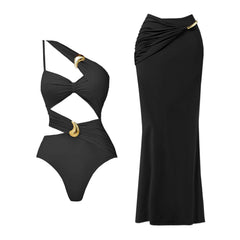 Black one shoulder swimsuit with cut-outs and a maxi skirt