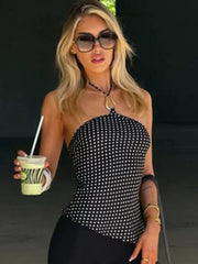 Black polka dot halter neck crop top with sunglasses