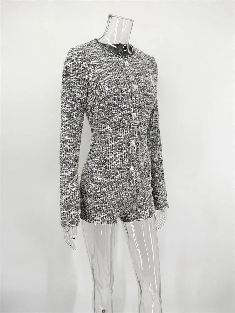 Black and white patterned jacket on a transparent mannequin against a white background