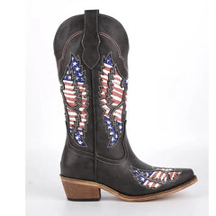 Side view of black embroidered wing western boots with pointed toe