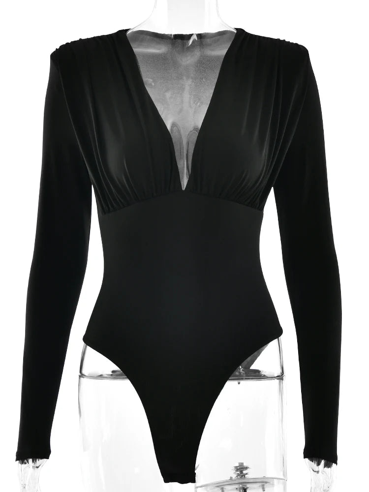 Black bodysuit with long sleeves on a white background