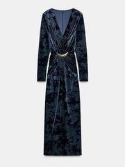 Dark blue velvet dress with a belt on a white background