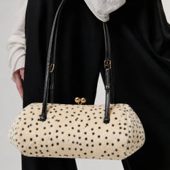 Creamy-white polka dot fur shoulder bag with black straps