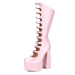 Pink platform boot with unique design on a white background