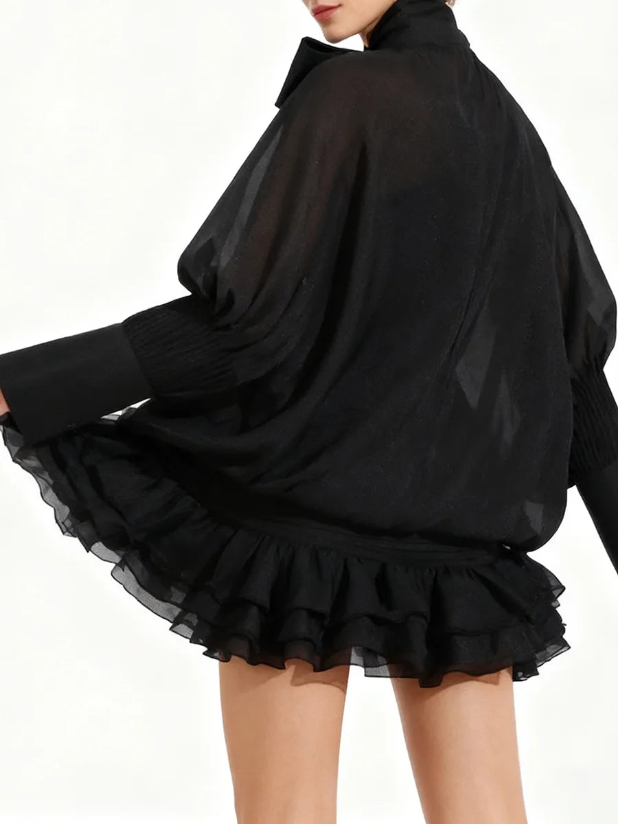 Black ruffled dress back view
