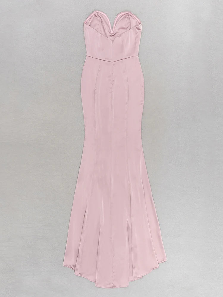 Pink strapless gown on a light gray background