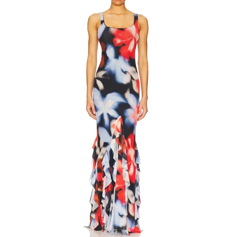 Woman wearing a colorful floral dress on a white background