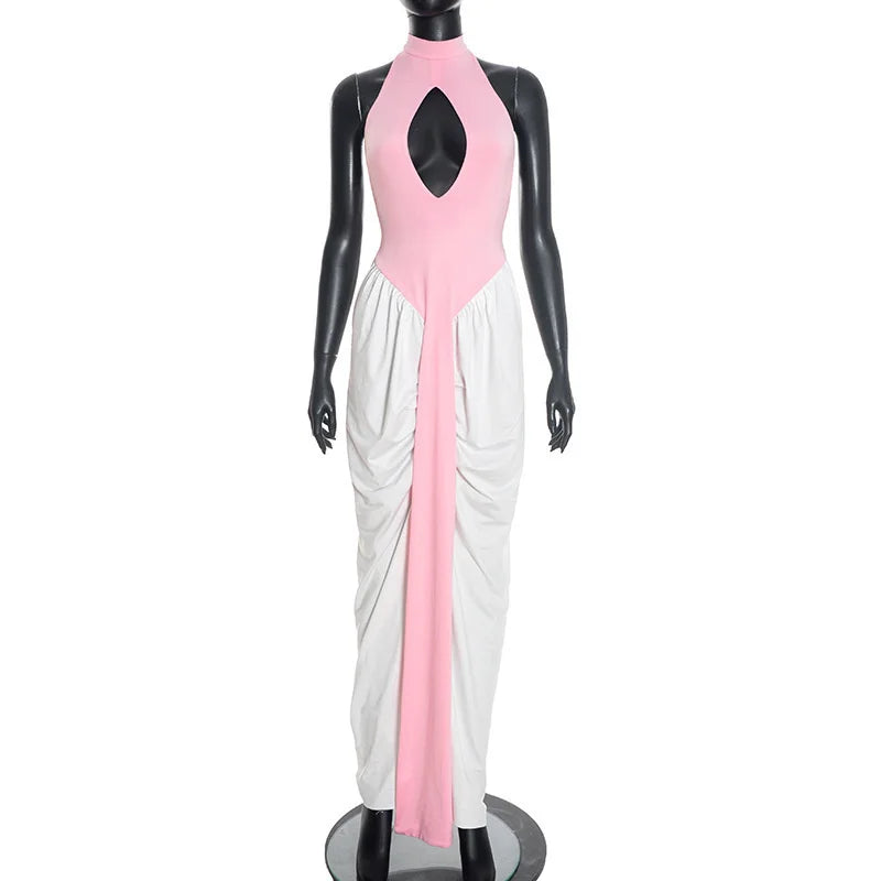 Mannequin wearing a pink and white dress with a cutout design on a white background
