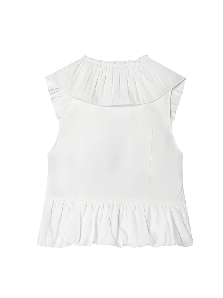 Back view of a white sleeveless peplum top with a high neckline.