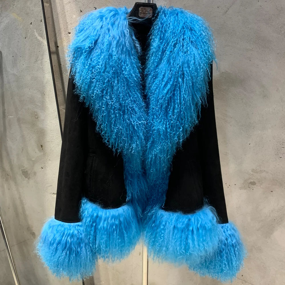 Black coat with blue fur trim on a gray background