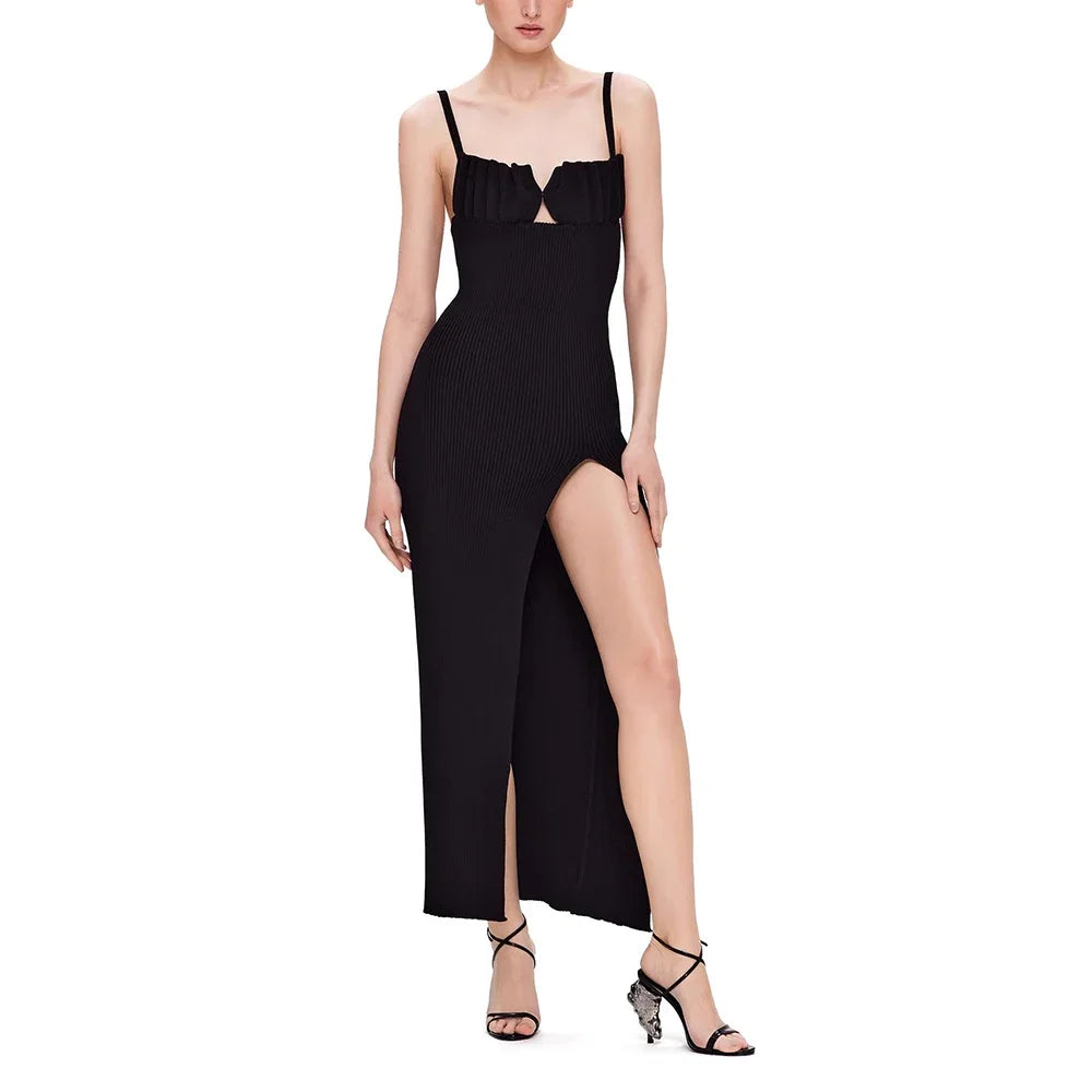 Black dress with a slit on a white background