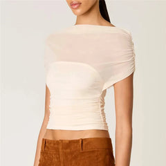 Side view of sheer ruched mesh off-shoulder crop top in cream