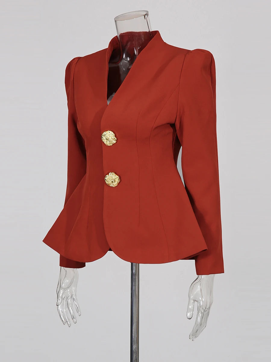 Red blazer with gold buttons on a mannequin against a gray background
