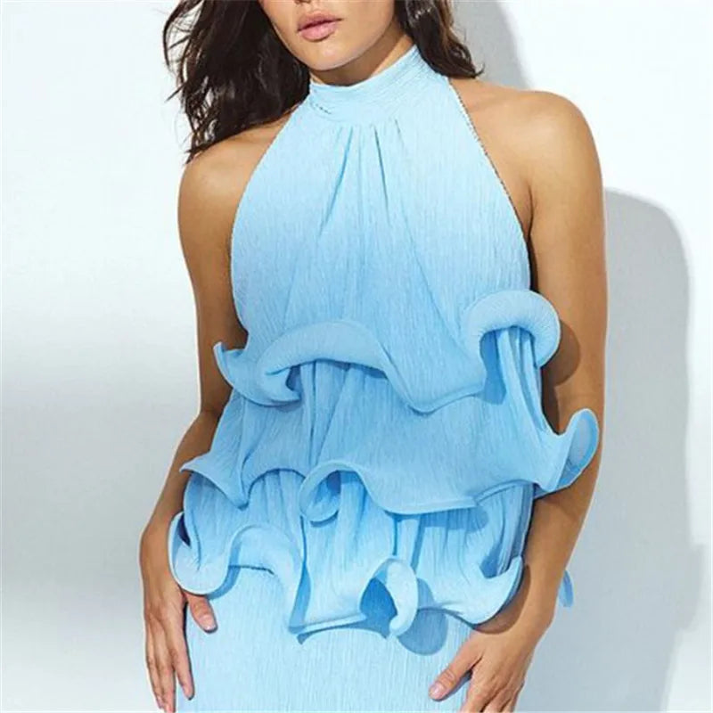 Close-up of blue halter neck ruffle crop top.