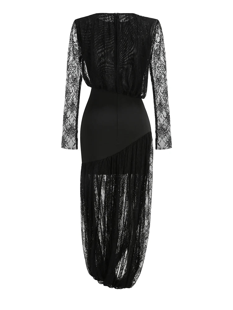 Detail of black lace split midi dress