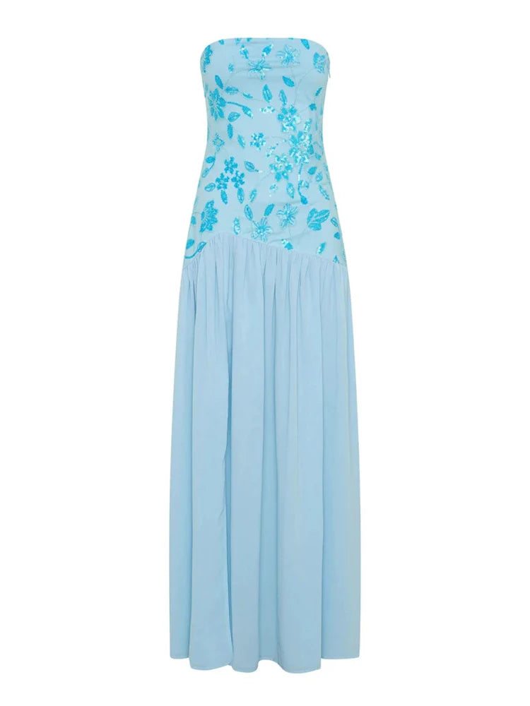 Light blue strapless dress with floral lace details on a white background