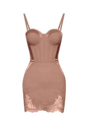 Nude-colored dress with lace details on a white background