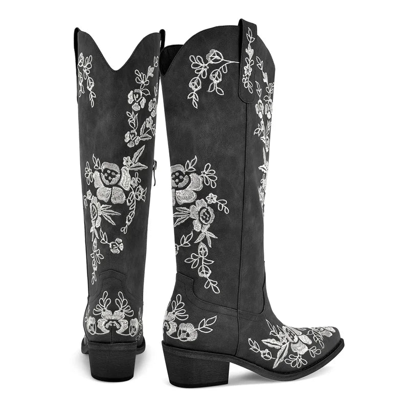 Pair of floral embroidered pointed toe boots