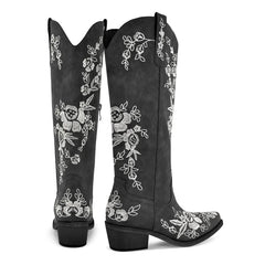 Pair of floral embroidered pointed toe boots
