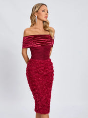 Red off-shoulder dress with floral details on a white background