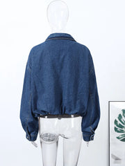 Blue denim jacket on a mannequin against a white background
