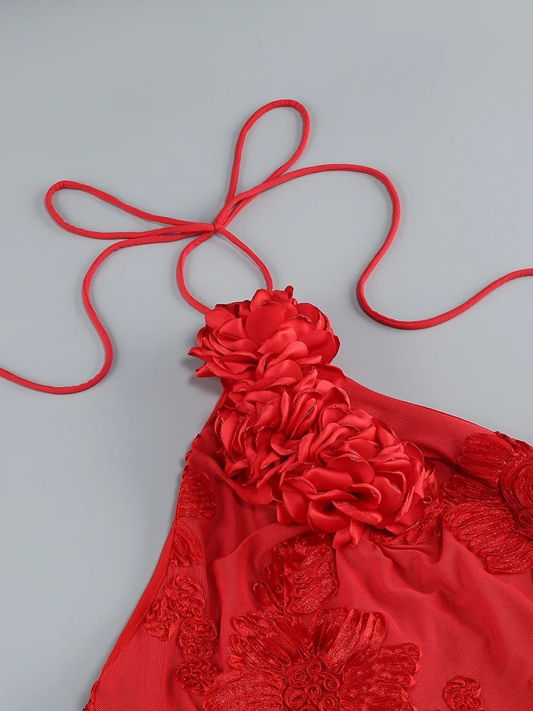 Red floral top with a gray background