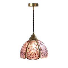 Decorative pendant light with pink floral pattern on a white background