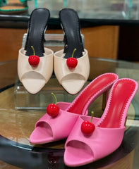 Pink pointed toe stiletto sandals with cherry accent