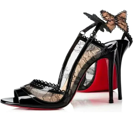 Black lace stiletto heel with peep toe and butterfly accent