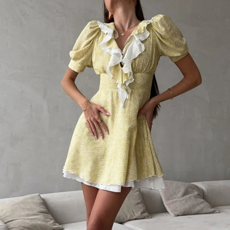 Model wearing floral ruffle v-neck puff sleeve mini dress