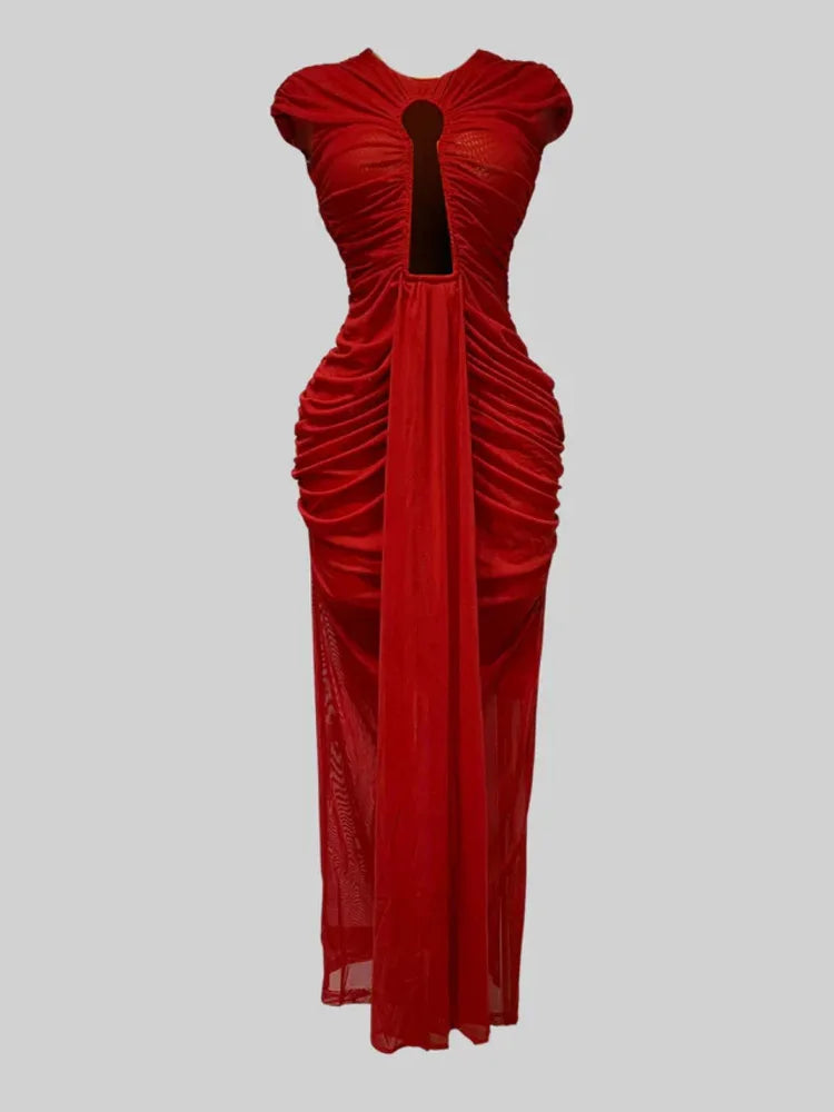 Red evening gown with a cut-out design on a gray background