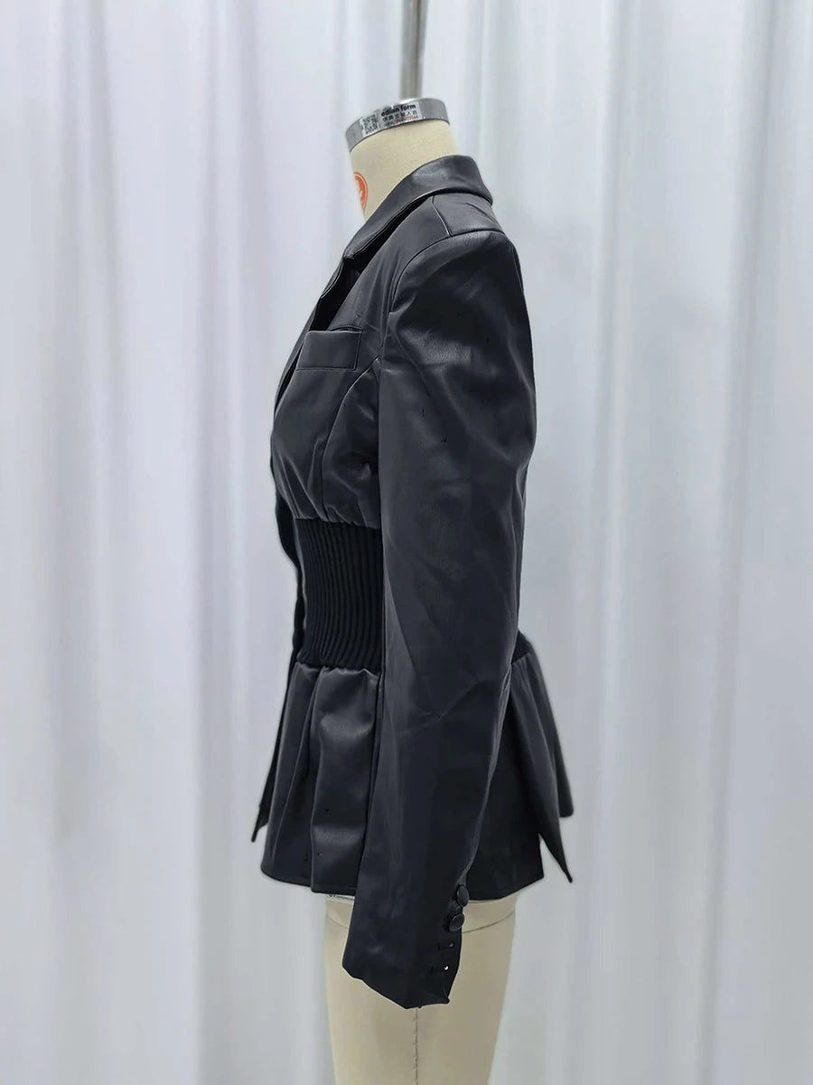 Black leather jacket on a mannequin against a white background