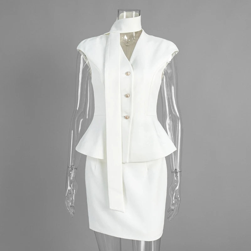 White sleeveless top and skirt set on a mannequin against a gray background