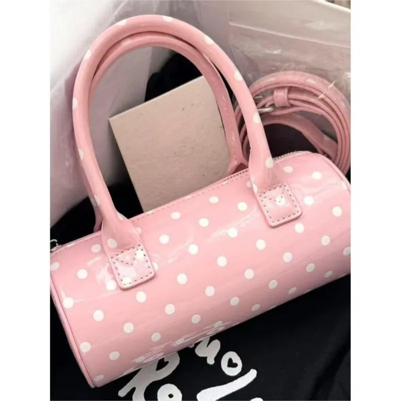 Pink polka dot cylinder handbag with strap