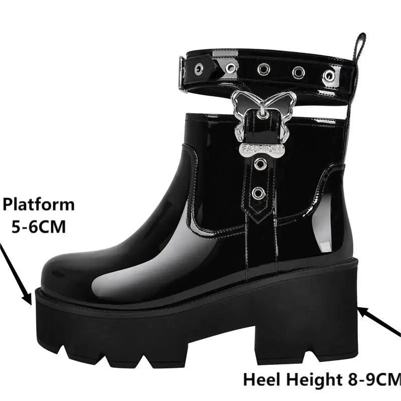 Close-up of platform height and heel on black patent boots