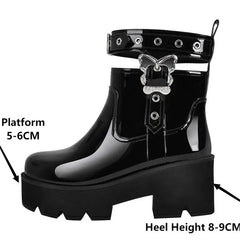 Close-up of platform height and heel on black patent boots