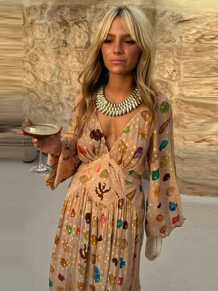 Close-up of the printed shell motif maxi dress.