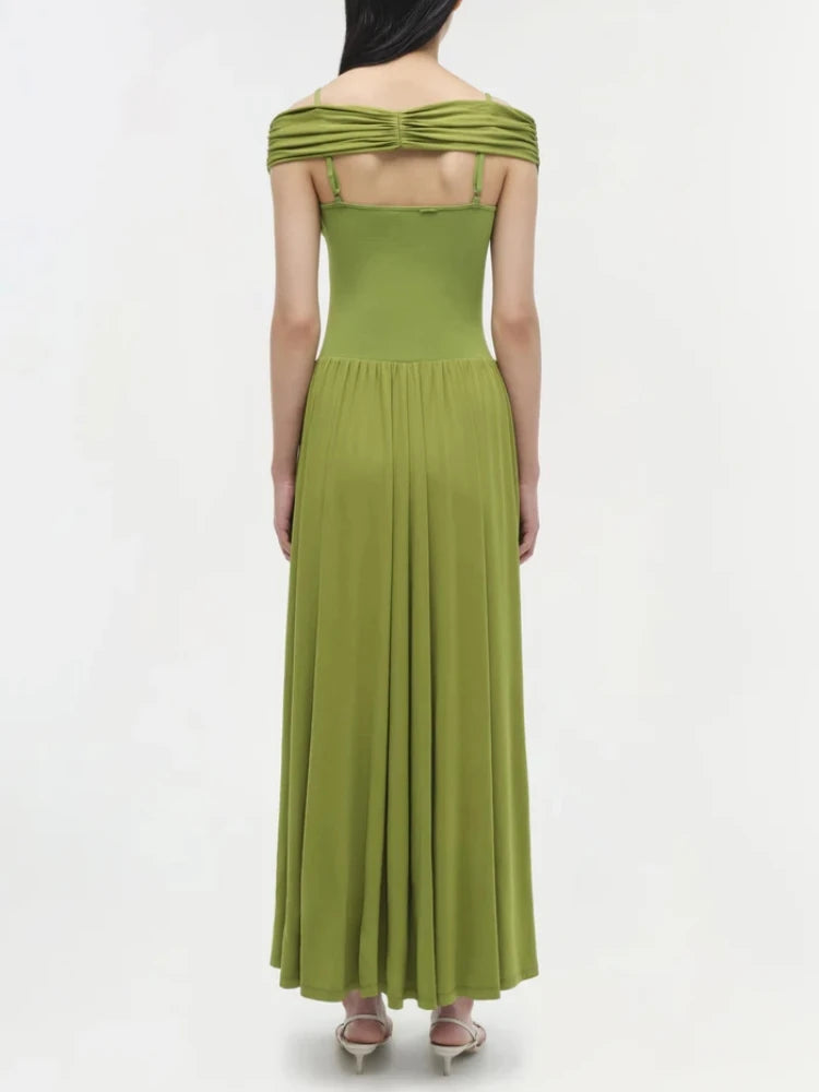 Green off-shoulder dress on a white background