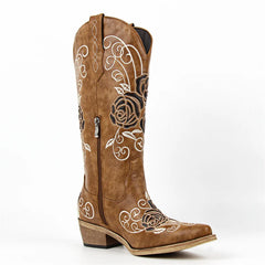Brown cowboy boot with floral embroidery on a white background