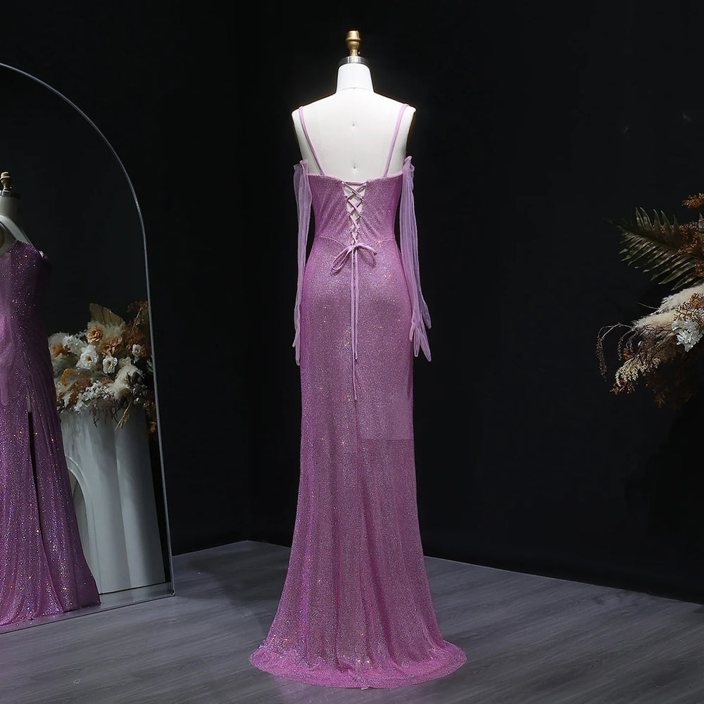 Purple evening gown on a mannequin against a dark background